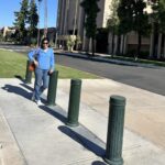 woman-standing-by-bollards